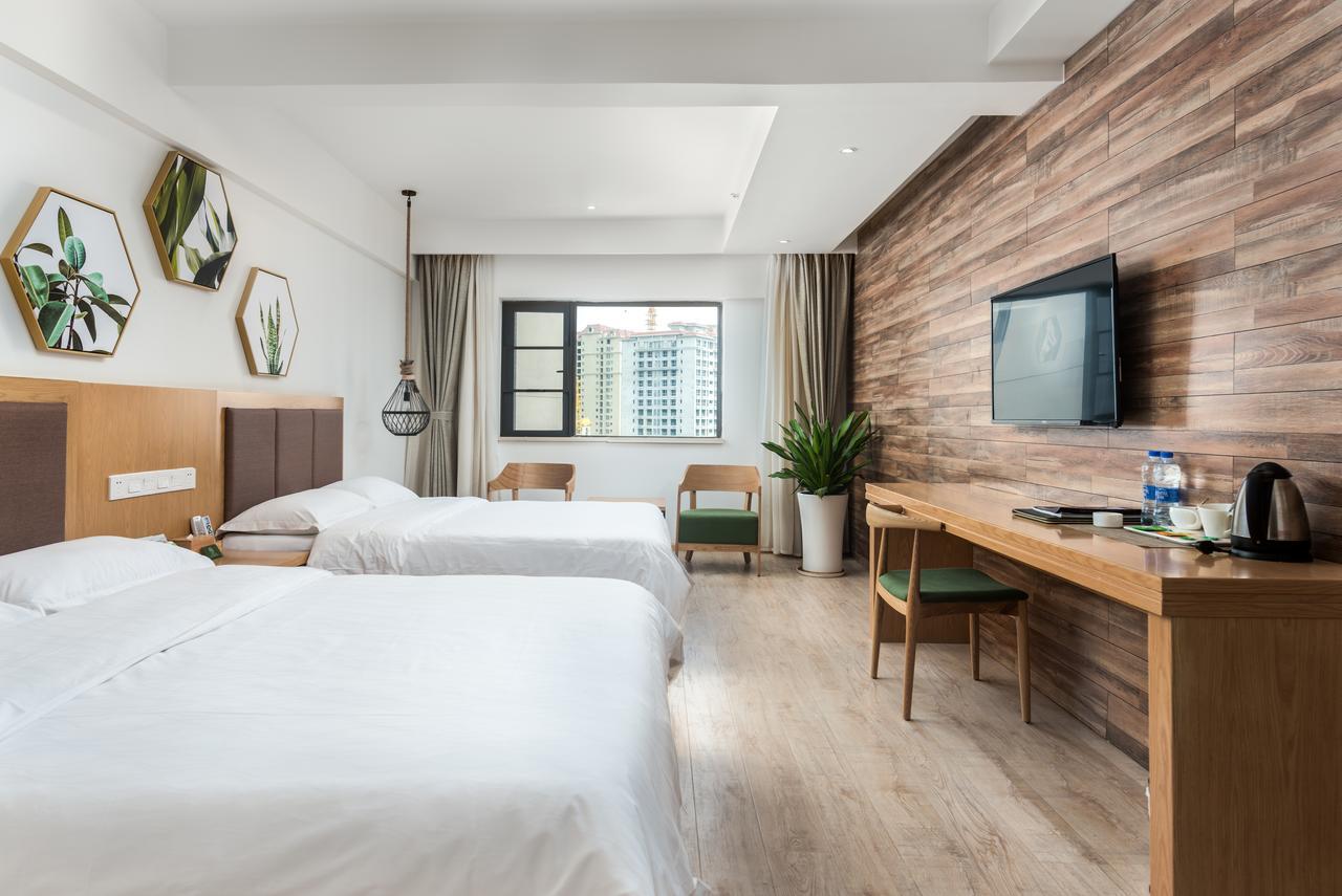 Blossom Play&Design Hotel Куньмин Экстерьер фото