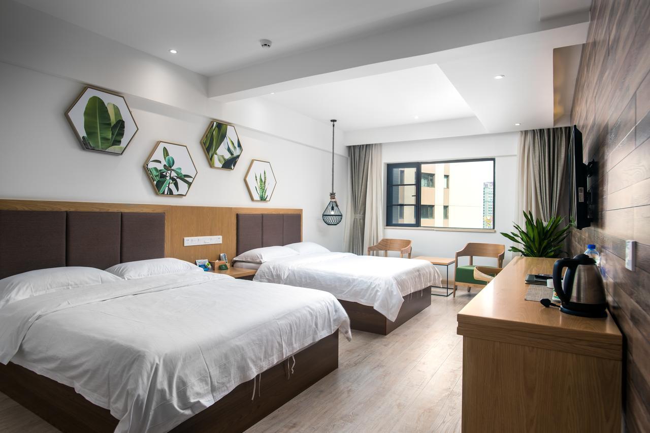 Blossom Play&Design Hotel Куньмин Экстерьер фото