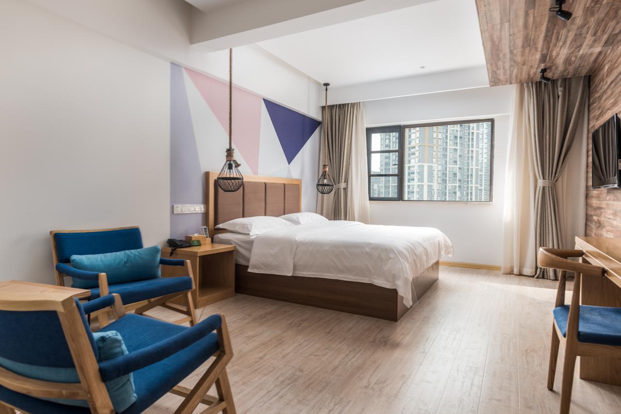 Blossom Play&Design Hotel Куньмин Экстерьер фото